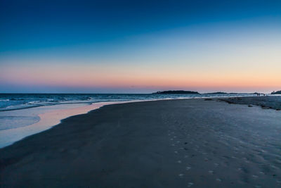 Scenic view of sea at sunset