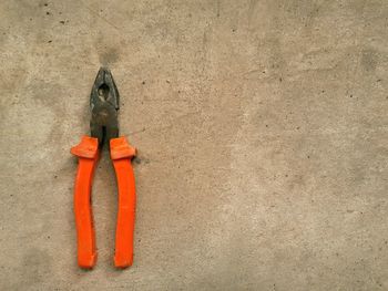 High angle view of various tools on floor