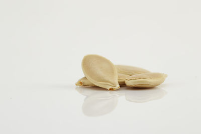 Close-up of cake against white background