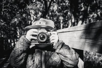 Portrait of man photographing