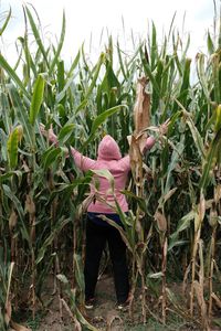 Woman standing in field