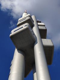 Low angle view of smoke stack against sky