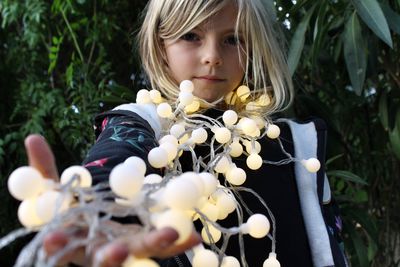 Close-up of girl playing outdoors