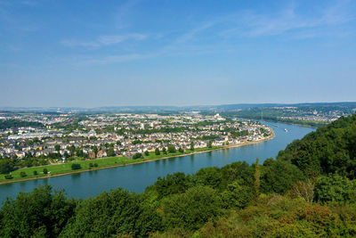 High angle view of river amidst buildings in city