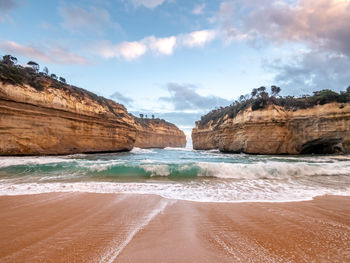 Scenic view of beach against sky