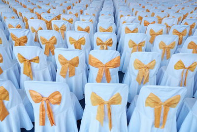 Full frame shot of chairs arranging in event