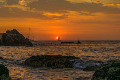 Scenic view of sea against sky during sunset