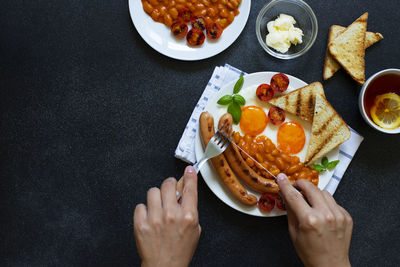 High angle view of hand holding food