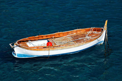 High angle view of boats moored in river