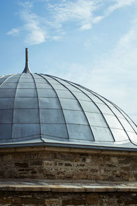 Low angle view of modern building against sky