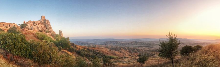 Scenic view of landscape against sky during sunset