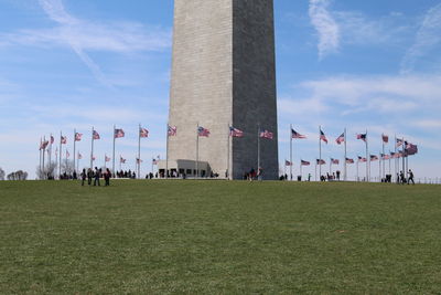 View of flags with buildings in background