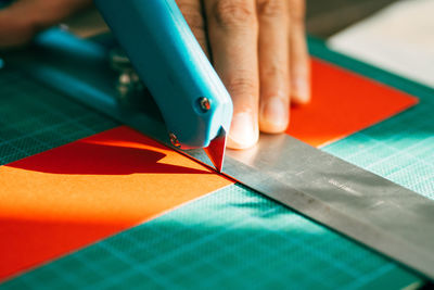 Cropped image of man working at table