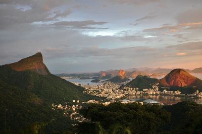 Scenic view of mountains against cloudy sky