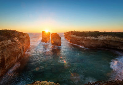 Scenic view of sea against sky during sunset