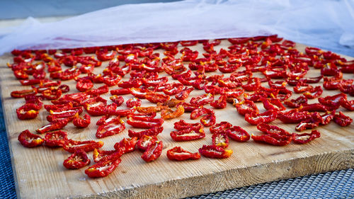 High angle view of strawberries on cutting board