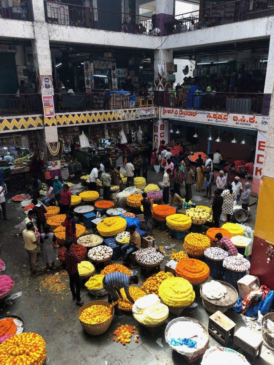 GROUP OF PEOPLE IN MARKET