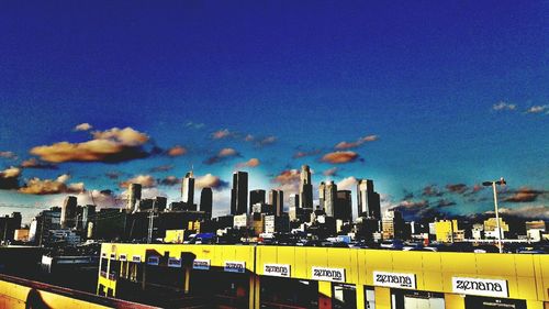Cityscape against blue sky