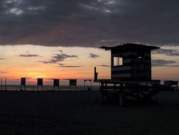 Scenic view of dramatic sky at sunset