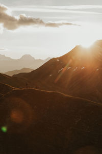 Scenic view of landscape against sky during sunset