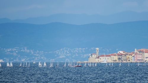 Scenic view of sea against blue sky