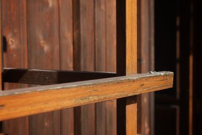 Close-up of wooden railing