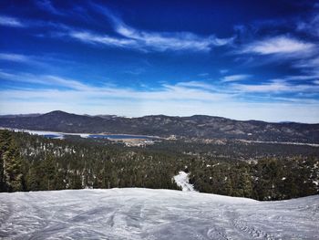 Scenic view of mountains against sky during winter