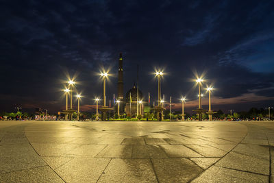 Illuminated street lights at night