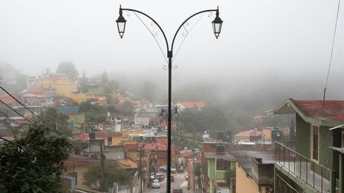 Buildings in city during rainy season