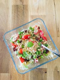 High angle view of chopped vegetables in bowl on table