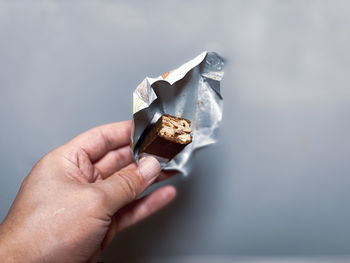 Close-up of hand holding food