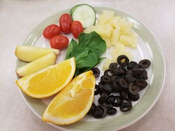 Close-up of fruits in plate