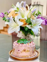 Close-up of pink flowers on table