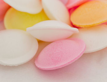 Close-up of multi colored candies on table