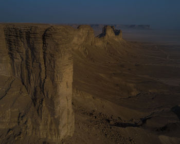 Scenic view of desert against clear sky