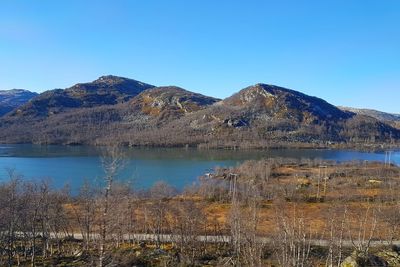 View of lake with mountain range in background