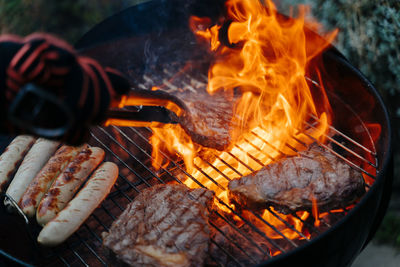 Close-up of meat on barbecue grill