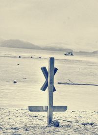 Scenic view of sea against sky during winter