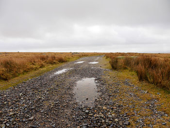 Surface level of road against sky