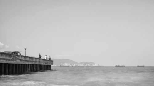 Scenic view of sea against clear sky