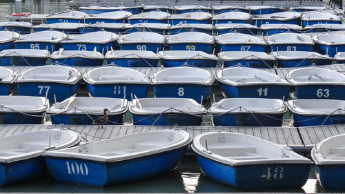 Full frame shot of pedal boats moored at harbor