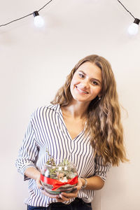 Portrait of a smiling young woman