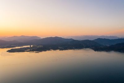 Scenic view of landscape against sky during sunset