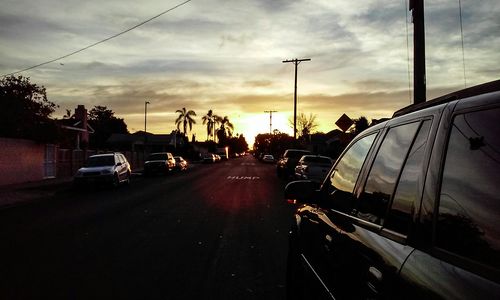 View of road against cloudy sky