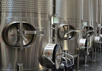 Close-up of distillery stills at factory