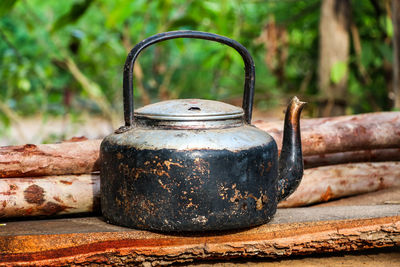 Close-up of old rusty metal on table