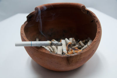 Close-up of cigarette on table