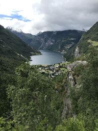 Scenic view of la fjord and mountains against sky