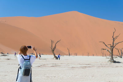 Scenic view of desert against clear sky