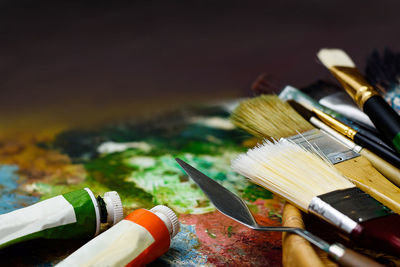 High angle view of paintbrushes on table